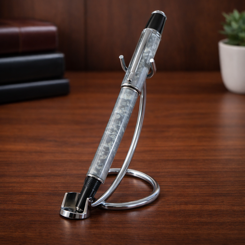 Luxury fountain pen with marble design on a sleek metal stand, on wooden desk