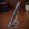 Luxury marbled fountain pen on chrome holder, wooden desk, modern office decor