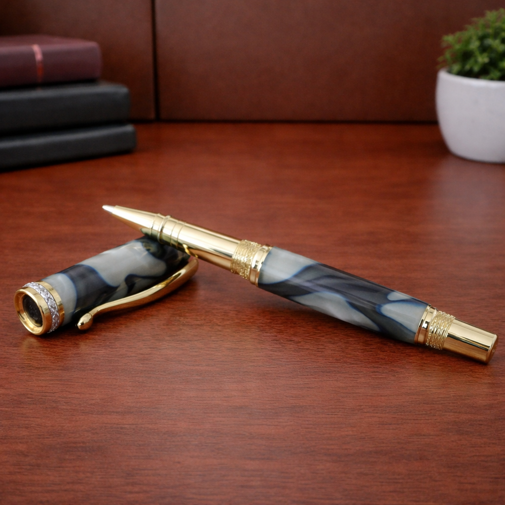 Luxury marbled fountain pen with gold accents on wooden desk, elegant writing instrument