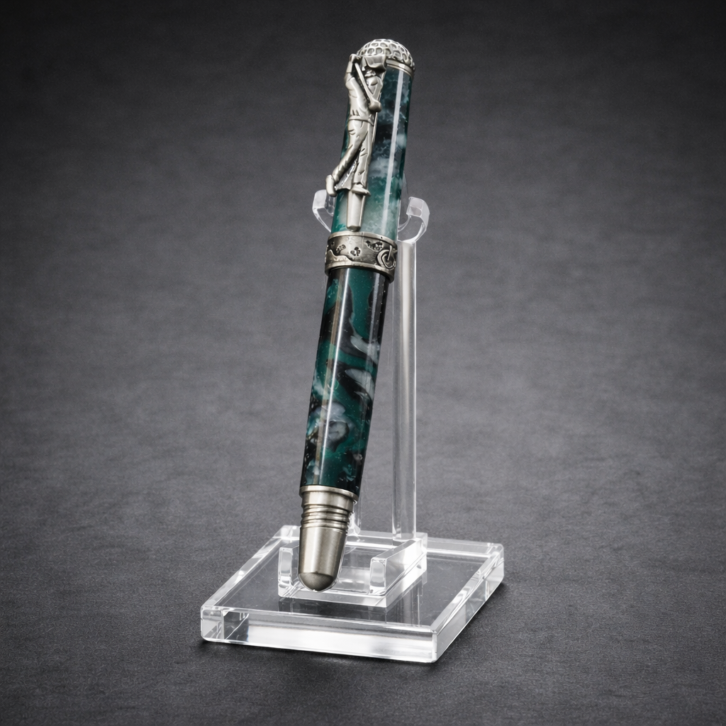 Luxury marbled fountain pen with silver golfer detail on cap, displayed on acrylic stand